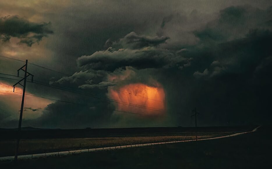 lightning strike on road during night time